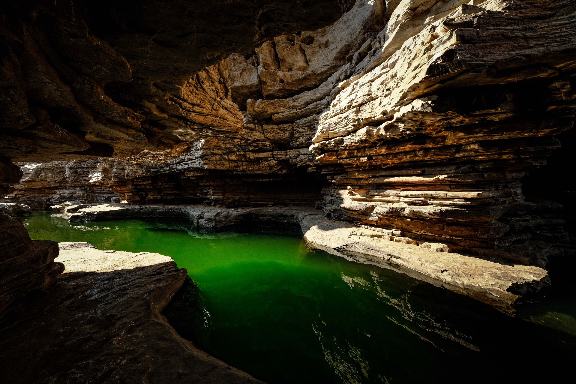 Emerald Cave at Koh Mook, an inner lagoon of emerald-green water ringed by limestone cliffs